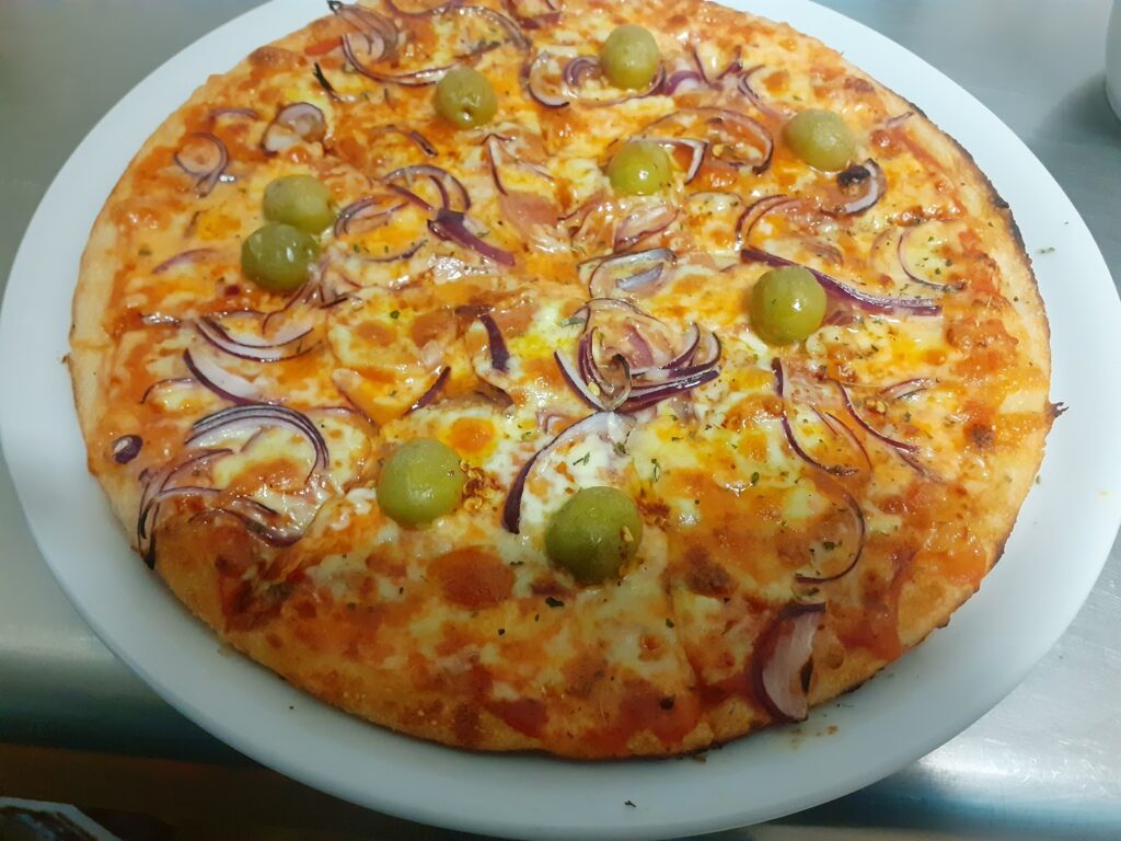 RESTAURANTE PIZZERIA ROMA CALA MILLOR: dónde el ambiente también forma parte del menú, imagen 2
